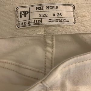 Free People Wide Leg white/cream colored jeans.